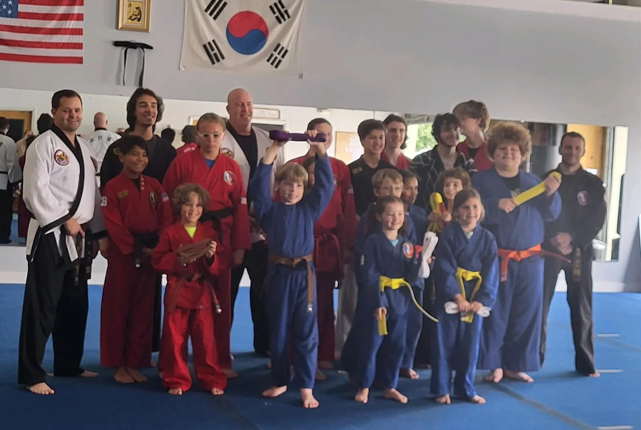Students of all ages lined up together after class at Cape Fear Martial Arts in Wilmington